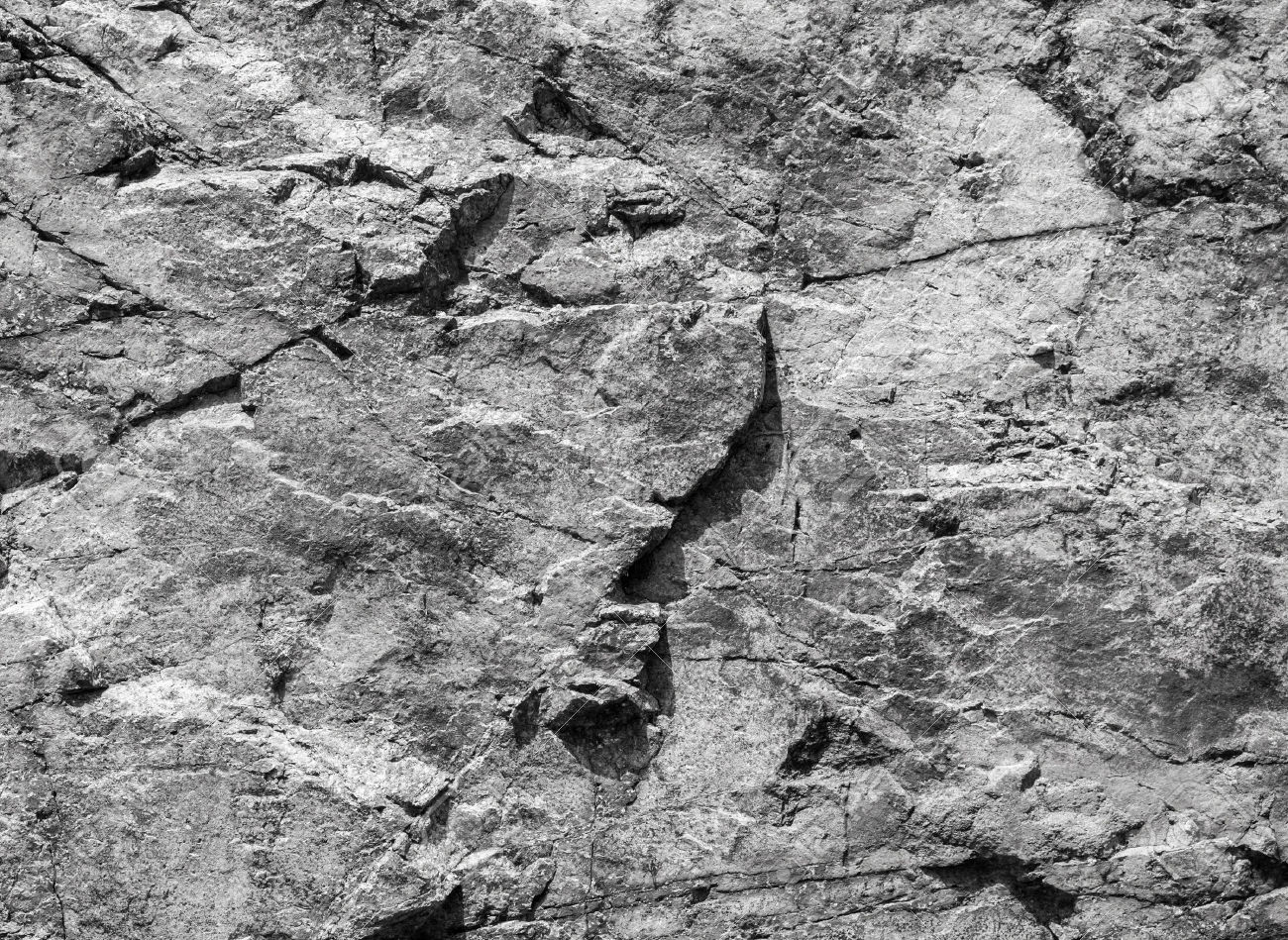 42726204-parete-di-roccia-grigio-scuro-pietra-naturale-sfondo-struttura-superficie-archivio-fotografico